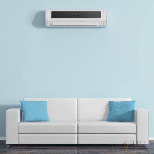 Air Conditioner Unit on the Wall Above a Sofa